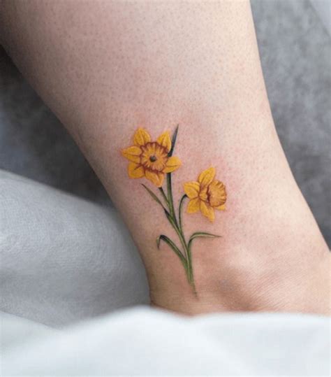 birth flower of march tattoo|daffodil march birth flower tattoo.